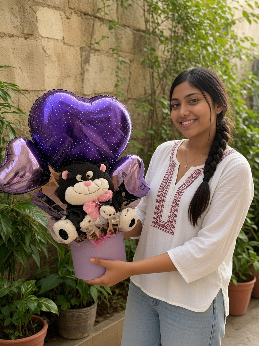 Ancheta de peluches con corazón morado