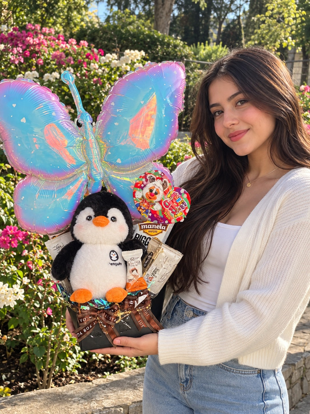 Ancheta de pingüino con mariposa